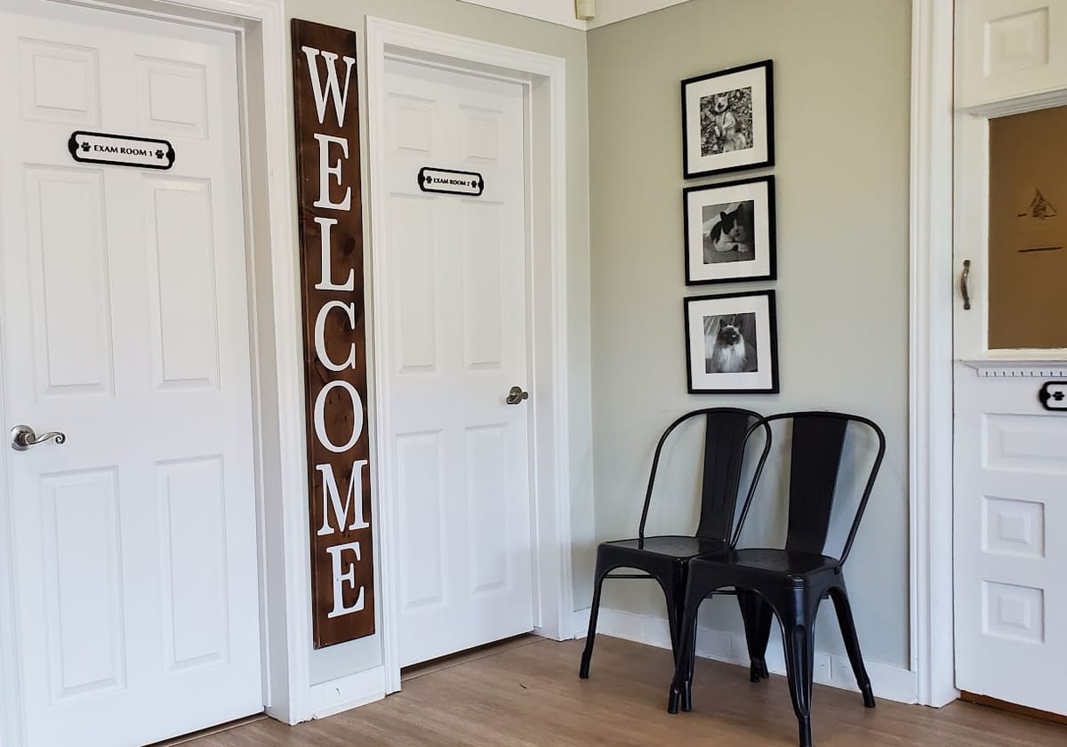 The clinic's two exam room doors and waiting area